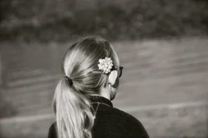 young child looking at fields on their way to therapist for childhood trauma