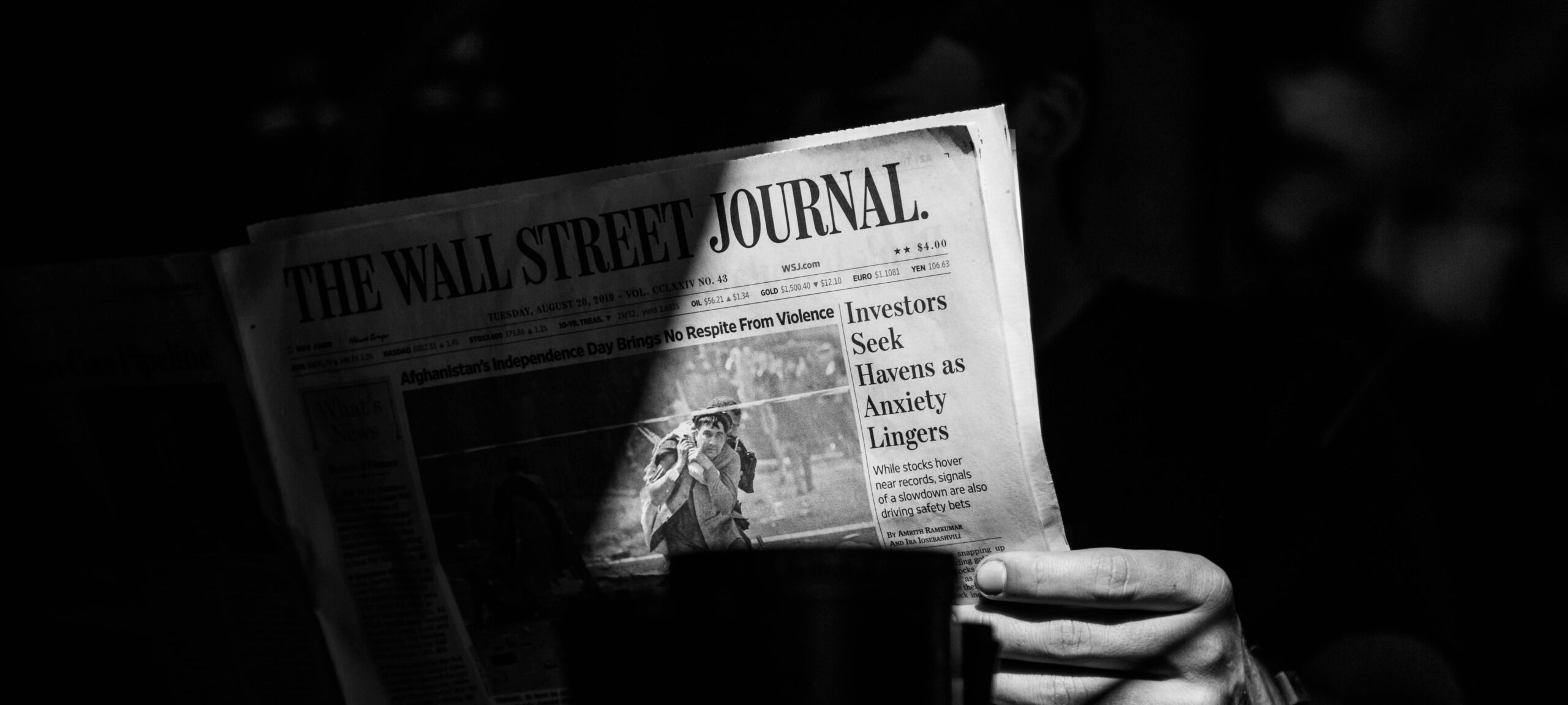 man reading newspaper