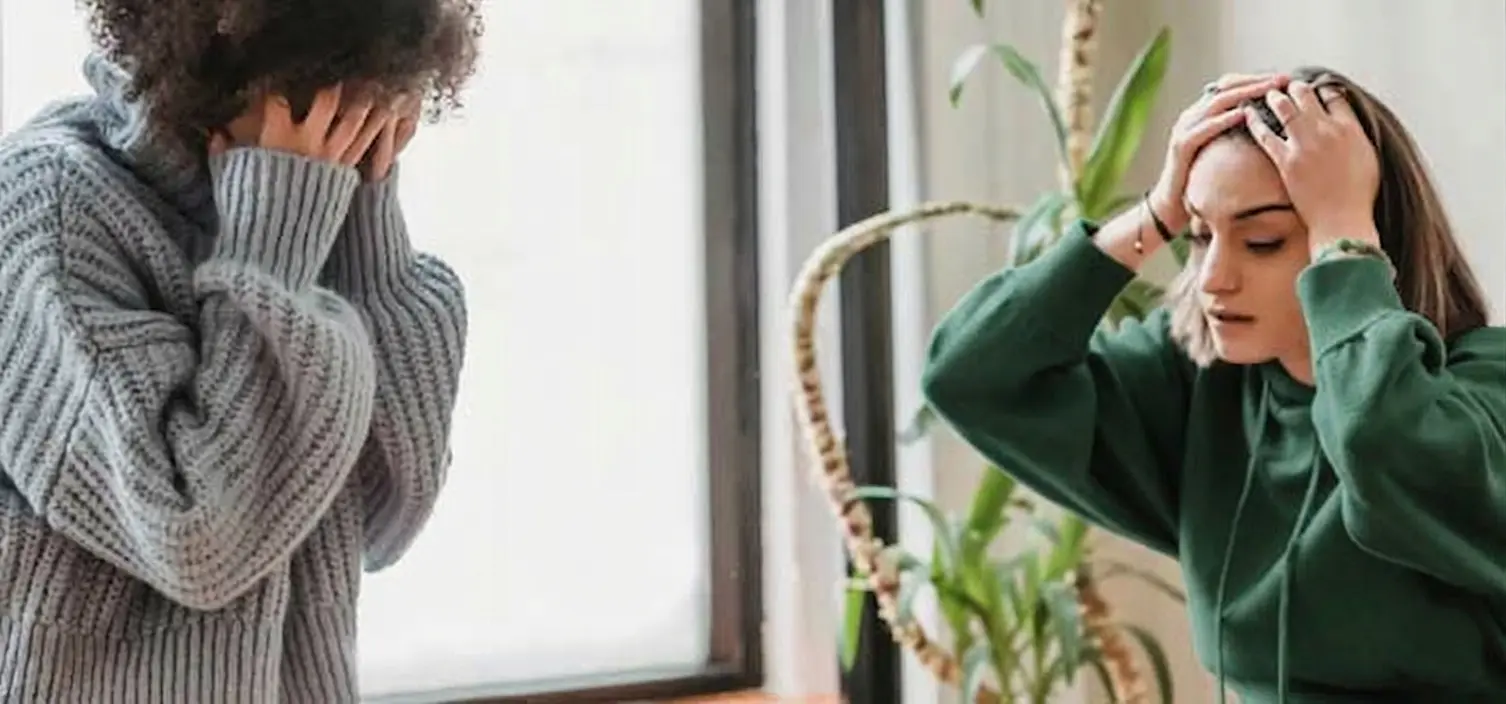 women looking stressed during conversation
